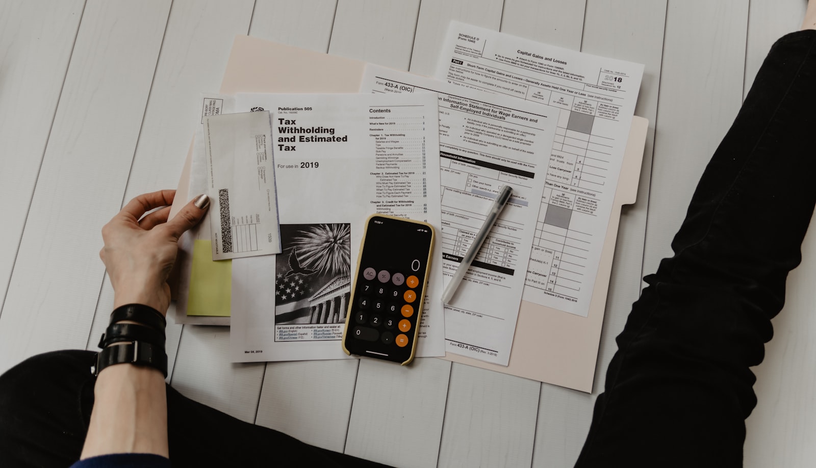 A marketer planning campaigns at a colorful desk